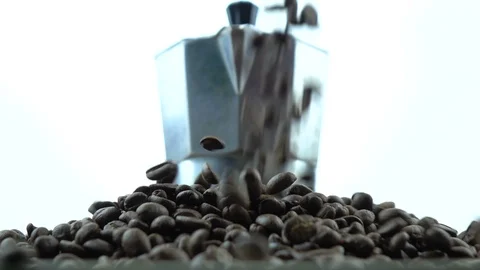 Falling coffee beans into moka pot Stock Footage 104807631