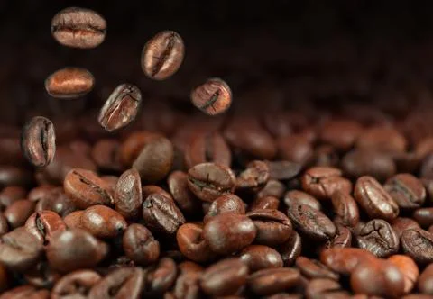 Falling coffee beans Stock Photos