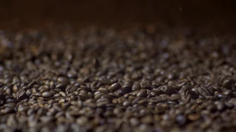 Falling Coffee Beans in Slow Motion with Bokeh Stock Footage 77032272