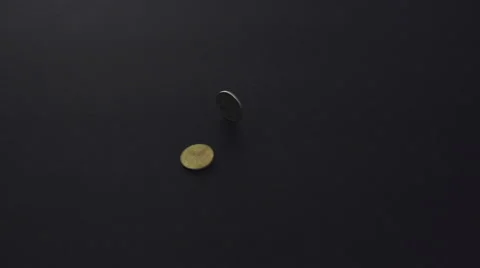 Falling coins on black background Stock Footage 55291389