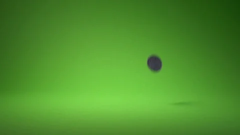 Falling coins on Green background. Stock Footage 120232054