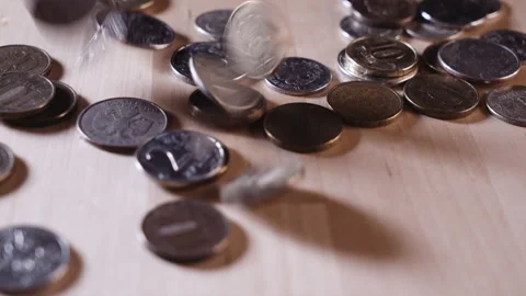 Falling coins on the surface Stock-Footage 152416394
