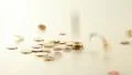 Falling coins on white background HD Footage
