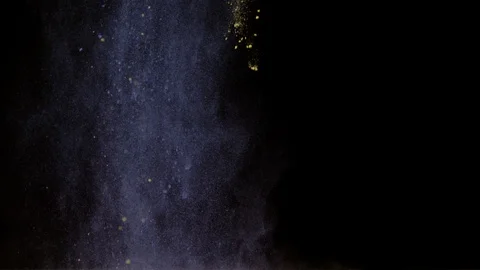 Falling colored powder on black background, Ultra Slow Motion Stock Footage 86576540