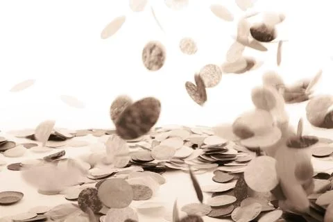 Falling confetti creating a festive and celebratory atmosphere in sepia tones Stock Photos