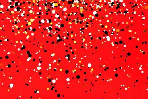Falling confetti on red background Stock Photos