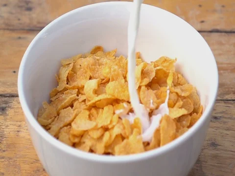 Falling of corn flake in real slow motion Stock Footage