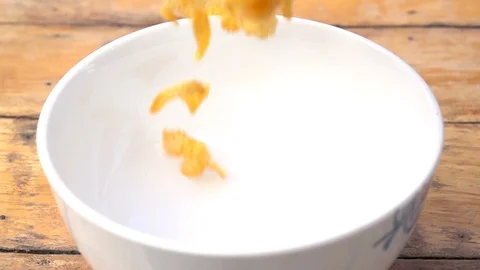 Falling of corn flake in real slow motion (250 FPS) Stock Footage 90622708