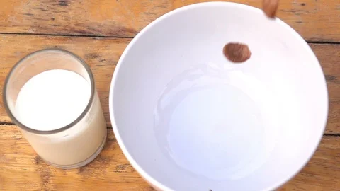 Falling of corn flake in real slow motion (250 FPS) Stock Footage 90623028