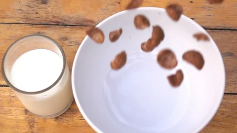 Falling of corn flake in real slow motion (250 FPS) Stock Footage 90623493