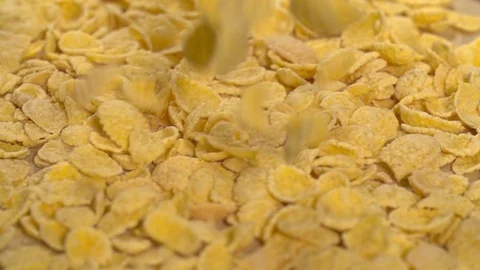 Falling Corn Flakes background Slow motion video Stock Footage 107939953