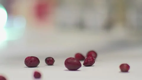 Falling cranberries on a white surface- 库存影片 147908097