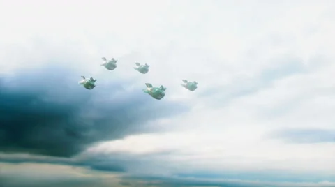 Falling crazy bombs against the dark sky. Funny bombs.  Stock Footage 68620723