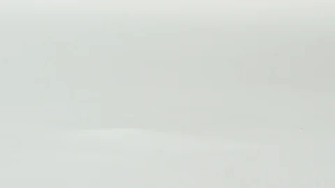 Falling dice in super slow motion turning against a white grey background. 動画素材 71016008