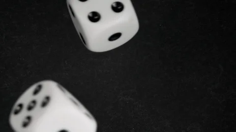 Falling dices on black background. Stock Footage 127633887