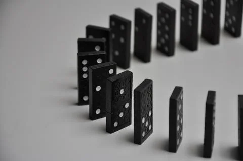Falling domino Stock Photos