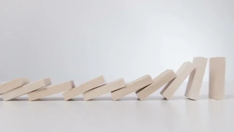 Falling Domino in a Row Slow Motion Stock Footage