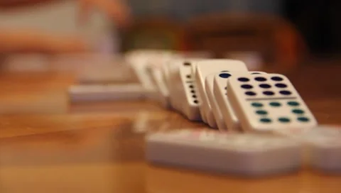 Falling Dominoes In A Line Part #2 setting up again Stock Footage