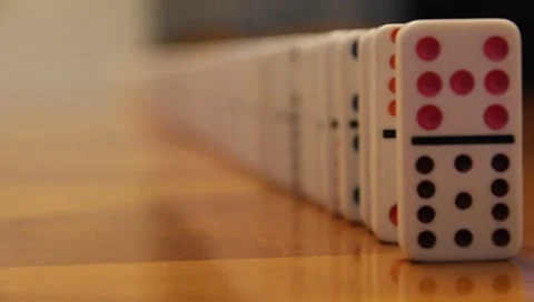 Falling Dominos In A Line Part #1 Stock Footage 7748681