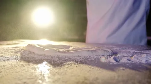 Falling dough into flour on table Stock Footage 170232907