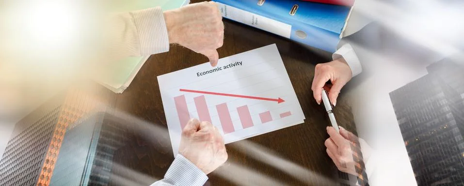 Falling down of economic activity; multiple exposure Stock Photos