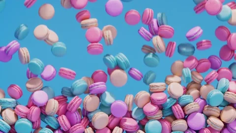 Falling down macarons. Delicious french almond cookies on a blue background. Video stock 201170685