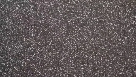 Falling down real snowflakes, heavy snow, snowstorm weather, shot on darck Stock Footage 84795154