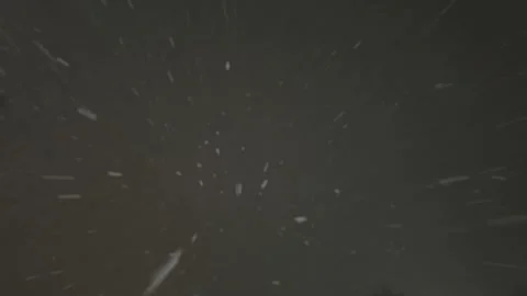 Falling down real snowflakes, heavy snow, snowstorm weather, shot on black Stock Footage 148882683
