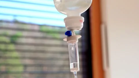 Falling Droplets of Liquid Medicine IV Drip at Various Dosing Speeds Stock Footage 165077650