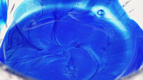 Falling drops of blue paint, abstract image Video stock 255886444
