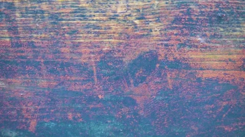 The falling drops break on a board Stock Footage 341616648