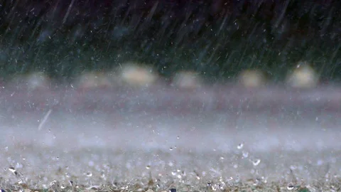 Falling drops of rain splash. Stock Footage 93126358
