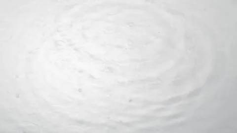 Falling drops on transparent water surface Stock Footage 278359142