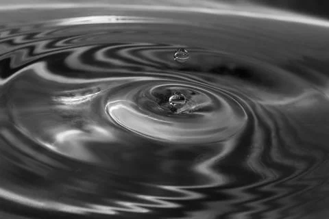 Falling drops in water 스톡 사진
