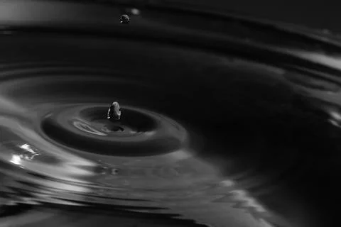 Falling drops in water 스톡 사진
