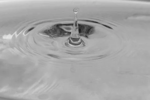 Falling drops in water 스톡 사진