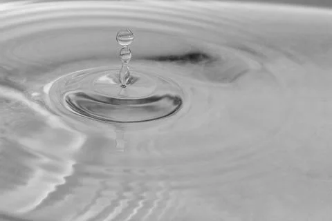 Falling drops in water 스톡 사진