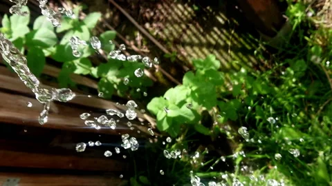 Falling drops of water slow motion Stock Footage 108636105