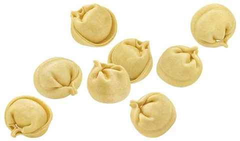 Falling dumplings isolated on white background Stock Photos