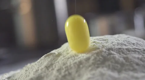 Falling eggs into flour Stock video Footage Stock Footage 36042894