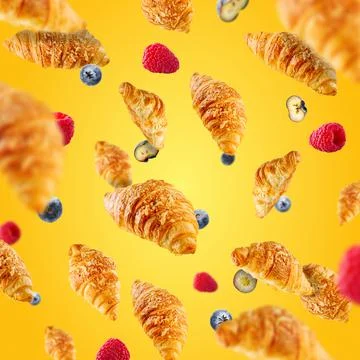 Falling fresh baked croissants with cheese. French pastry concept. Bakery Stock Photos