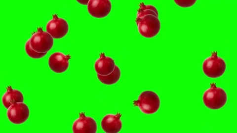 Falling fresh pomegranates motion graphics with green screen background Video stock 334986907