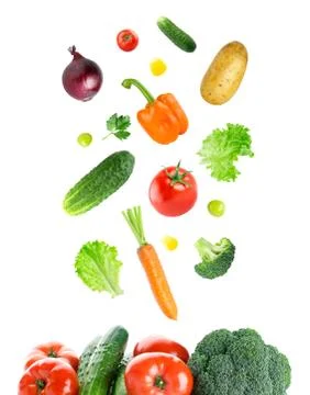 Falling fresh vegetables Stock Photos