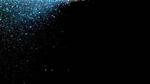Falling glitter particles. Shiny confetti magic, sparkling, bokeh light Stock Footage 122379041