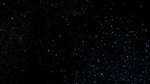 Falling glitter particles. Shiny confetti magic, sparkling, bokeh light Stock Footage 122381989