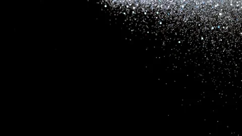 Falling glitter particles. Shiny confetti magic, sparkling, bokeh light Stock Footage 122382601