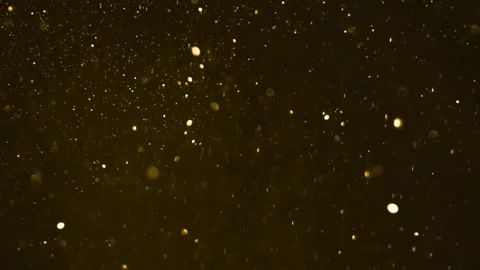 Falling gold bokeh particles full screen... | Stock Video | Pond5