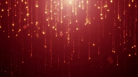 Falling gold particles flicker and shimmer against a wealth dark red background Stock Footage 75230873