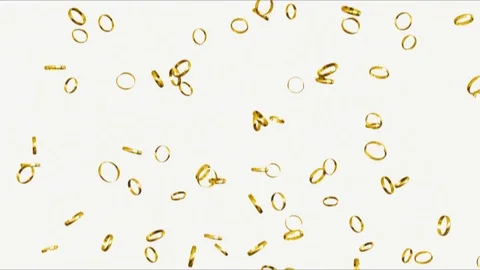 Falling Gold Rings on a White Background 库存影片 72299695