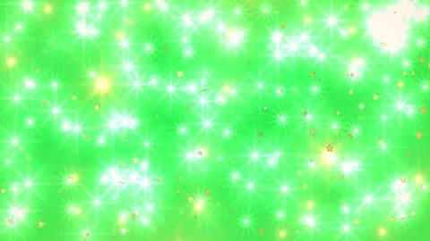 Falling Golden Confetti Particles Over A Bright Green Background With Glowing Stock-Footage 338368701